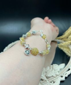 Alternative view of Vòng mix mẫu đơn tóc vàng và chú tiểu